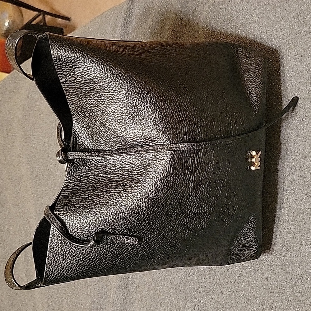 Michael Kors black pebbled leather tote bag w/tie top, long strap